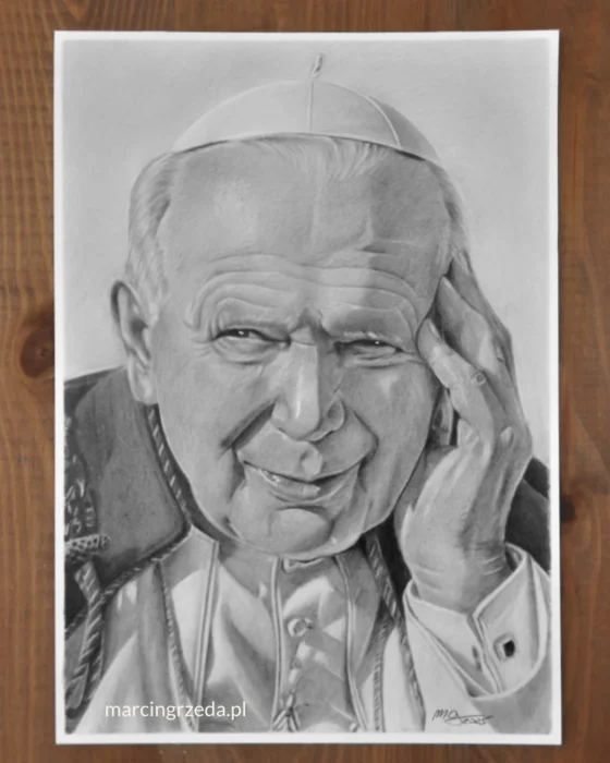 Portret wykonany ołówkiem na formacie A4. Przedstawia świętego Papieża Jana Pawła II. Papież na portrecie podpiera głowę ręką.